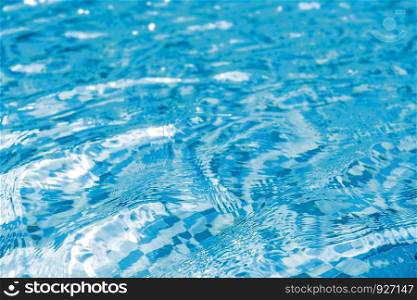Water in swimming pool texture background