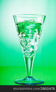 Water in the glass against gradient background
