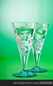 Water in the glass against gradient background