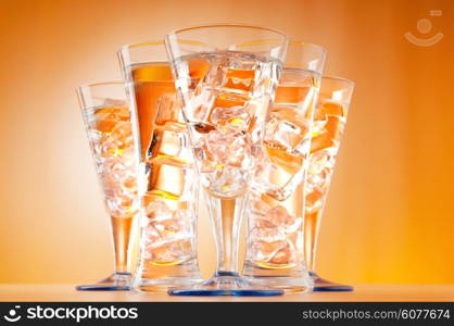 Water in the glass against gradient background