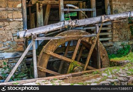 Water mill in the Etar Architectural Ethnographic Complex in Bulgaria on a sunny summer day. Etar Architectural Ethnographic Complex in Bulgaria