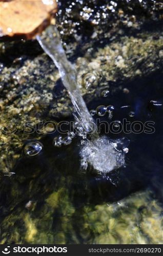 Water of a stone basin