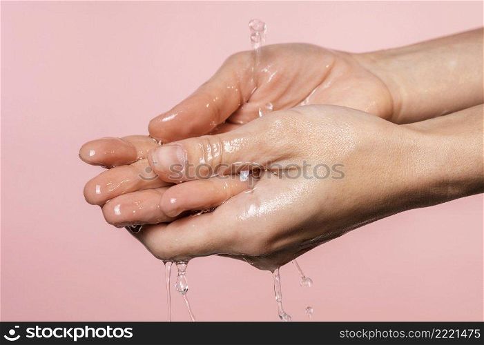 water poured woman s hands close up