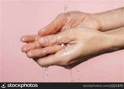 water poured woman s hands close up