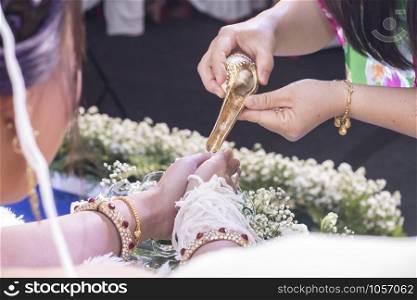 Water pouring ceremony for traditional thai style wedding