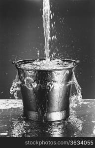 Water Pouring in Bucket