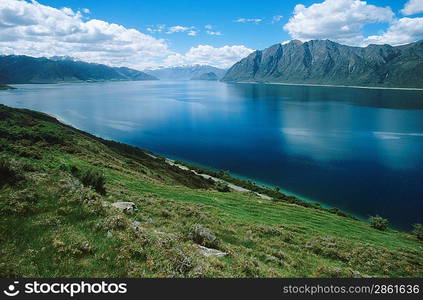 Water reservoir in mountain landscape