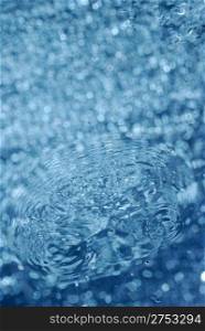 water ripple. A water table with effective drops stains on water