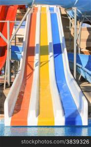 Water Slides at the Water Aquapark. Water Park for Kids at Sun Light. . Water Park