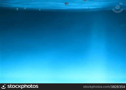 Water splash and air blue over dark background