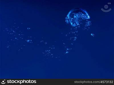 water splash. Clean blue water splash on dark blue background