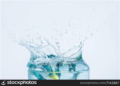 water splash in a glass white background