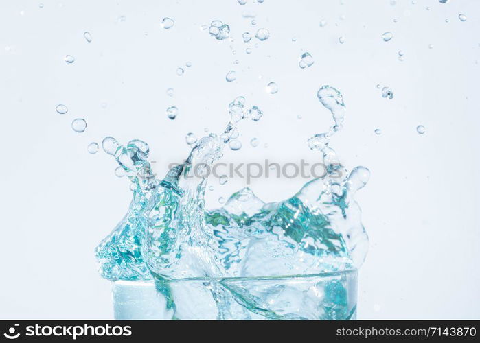 water splash in a glass white background