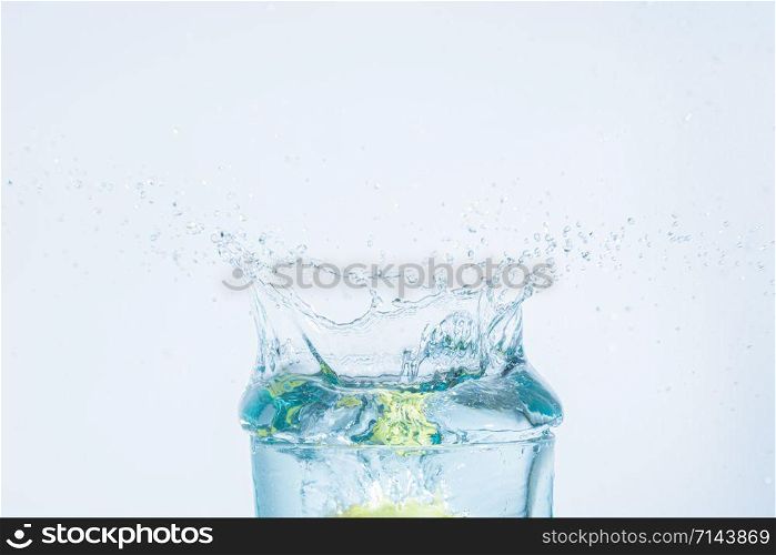 water splash of lemon in a glass