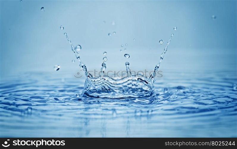 Water splash on blue background