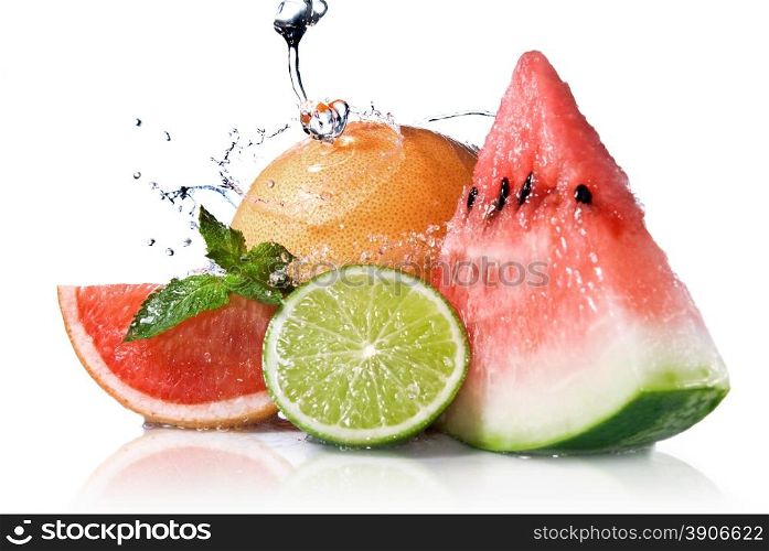 Water splash on fresh fruits isolated on white