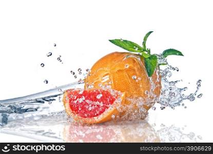 Water splash on grapefruit with mint isolated on white