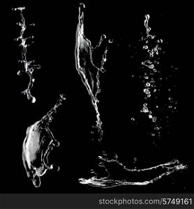 Water splashes collection isolated on black background. Water splashes collection