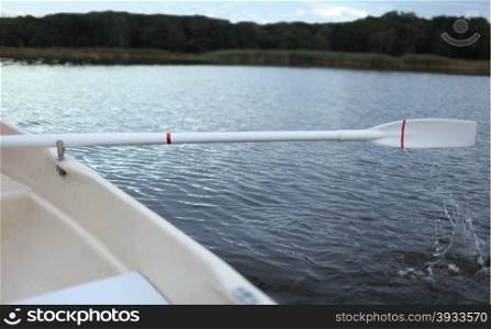 water splashing from the oars