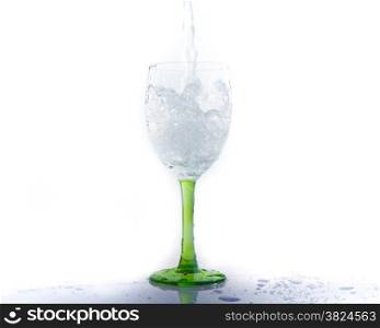 water splashing into a wineglass
