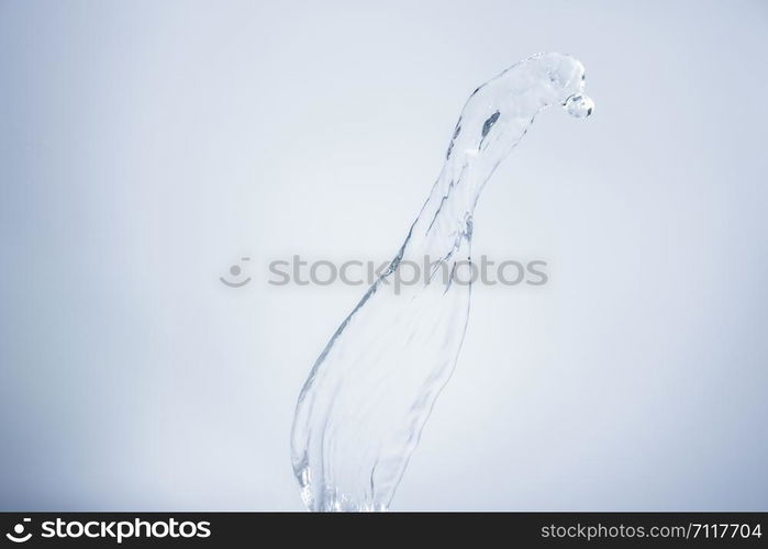 Water splashing on white background