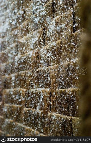 Water spray on brick wall, Singapore