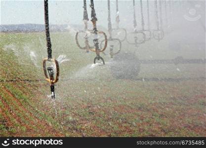 Water sprinklers of a center pivot crop irrigation system