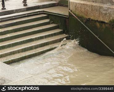 Water. Steps in docks on river bank side down to water
