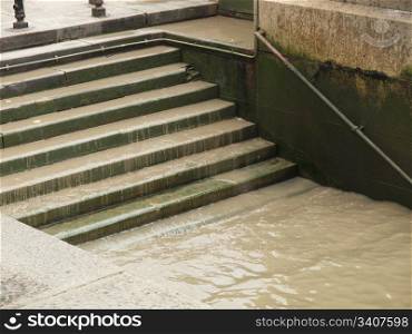 Water. Steps in docks on river bank side down to water