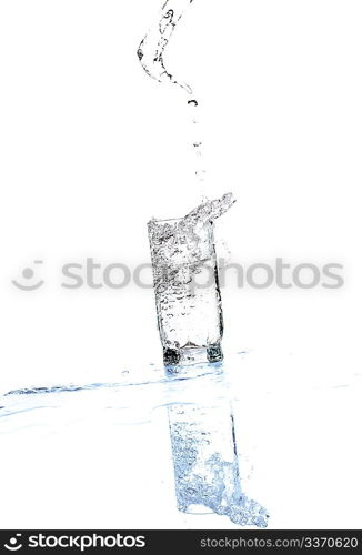 Water streaming from bottle isolated on white with shadow