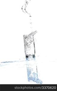 Water streaming from bottle isolated on white with shadow