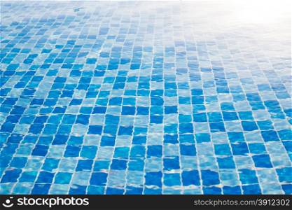 Water surface background in outdoor pool near sea