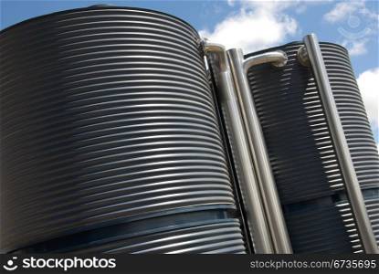 Water tanks adjacent to a new office building in Canberra, Australia