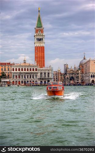 Water taxi, Venice lagoon, San Marco Piazza, Saan Marco Basilica, Campanile all in one image - very typical Venice
