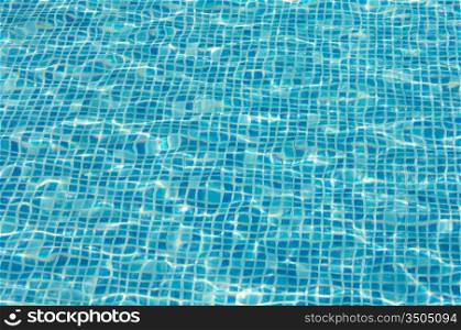 water texture of swimming pool in summer