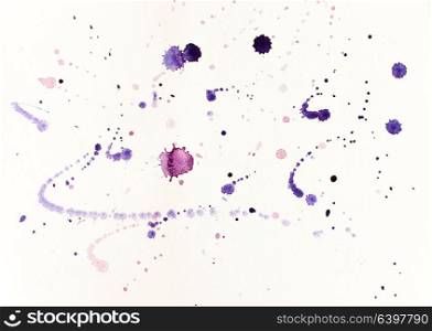 Watercolor blots and splashes of purple on the paper. Abstract illustration in violet tones