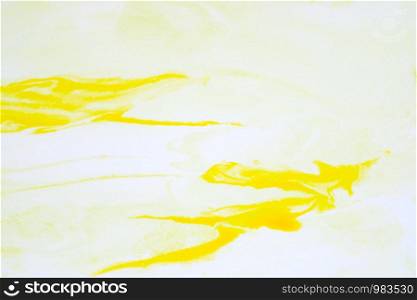Watercolor on paper background, art abstract yellow watercolor painting, color ink drop, in marble pattern textured design on white paper background