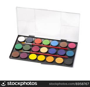 Watercolor paint and brush in black box, isolated on white background, with clipping path. Watercolor paint and brush