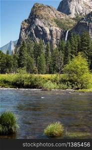 Waterfall and the Merced River in Yosemite on a Summer&rsquo;s Day