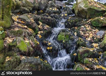 Waterfall cascade of mountain stream in the Lakatnik rock, Sofia province, Bulgaria