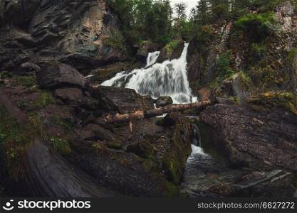 Waterfall in Altai Mountains territory, West Siberia, Russia. Waterfall in Altai Mountains