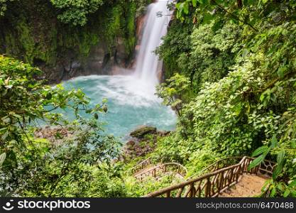 Waterfall in Costa Rica. Majestic waterfall in the rainforest jungle of Costa Rica. Tropical hike.