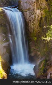 Waterfall in Galacier National Park, Montana, USA. Autumn season.