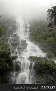 Waterfall in mist in Kinabalu national park in Sabah, Borneo, Malaysia