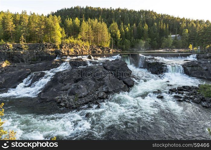 waterfall in norway near the jotunheimen national park