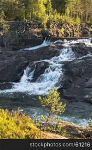 waterfall in norway near the jotunheimen national park