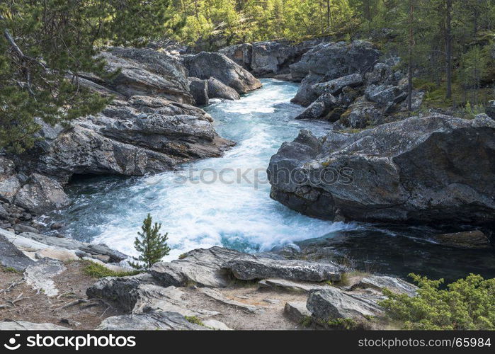 waterfall in norway near the jotunheimen national park in the village Leira near jotunheimen