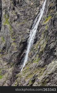 Waterfall in rocky mountains, beautiful nature in Norway.. waterfall in rocky mountains, Norway.