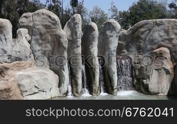 Waterfall in summer mountain