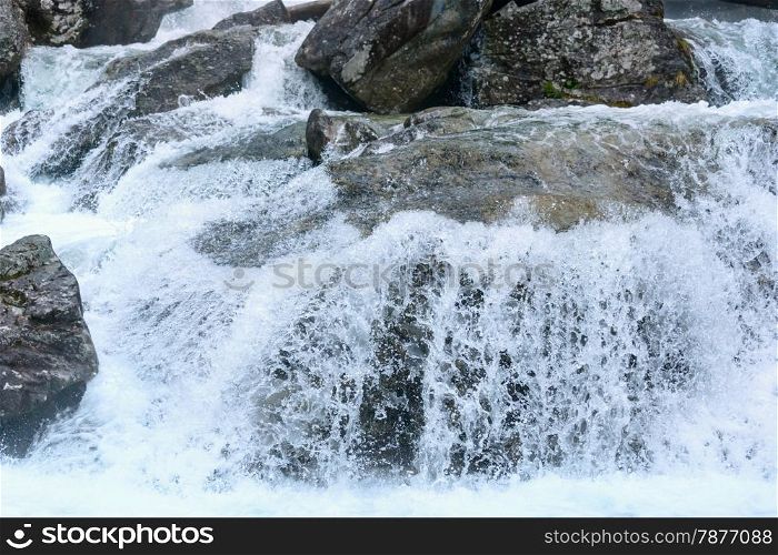 Waterfall in the Great Cold Valley (Velka Studena dolina). High Tatras, Slovakia.